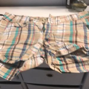 Plaid shorts.